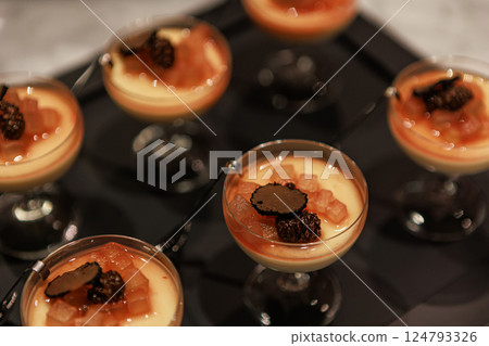 Elegant gourmet dessert served in delicate glassware 124793326