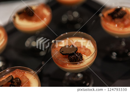 Elegant gourmet dessert served in delicate glassware 124793330