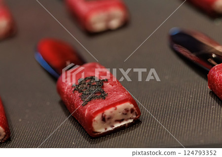 Exquisite gourmet appetizer featuring delicate slices of raw beef wrapped around a creamy filling 124793352