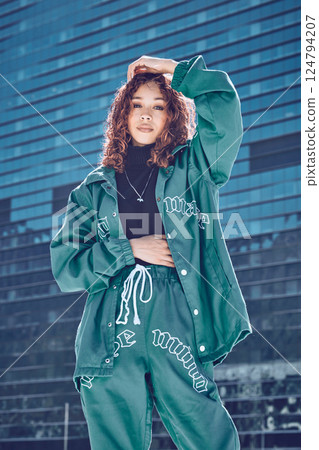Fashion, portrait and woman with, stylish, urban and street designer clothes in the city of Tokyo. Creative, cool and young fashion model girl with style, trendy and edgy by buildings in town Fashion, portrait and woman with, stylish, urban and street designer clothes in the city of Tokyo. Creative, cool and young fashion model girl with style, trendy and edgy by buildings in town 124794207