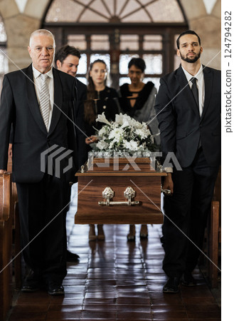 Funeral, church and family carry coffin for death, grief or sermon for burial with support. People, pallbearers and sad together with casket for respect, farewell or sorrow in mourning, mass or loss Funeral, church and family carry coffin for death, grief or sermon for burial with support. People, pallbearers and sad together with casket for respect, farewell or sorrow in mourning, mass or loss 124794282