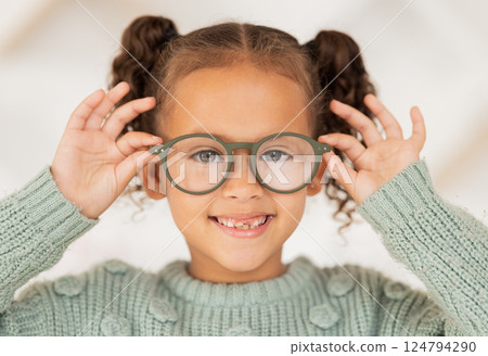 Vision, eye care and portrait of child with glasses for optical healthcare, eyesight support and test prescription eyeglasses. Optometry store, retail choice and happy youth girl trying on lens frame 124794290