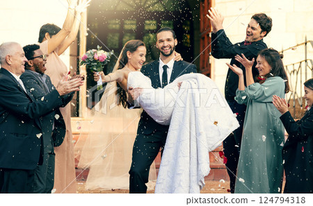 Wedding, love and man carrying woman outside church fo celebration of loving vows. Commitment and romance, romantic marriage, fun and man holding woman after love ceremony for bride and groom Wedding, love and man carrying woman outside church fo celebration of loving vows. Commitment and romance, romantic marriage, fun and man holding woman after love ceremony for bride and groom 124794318