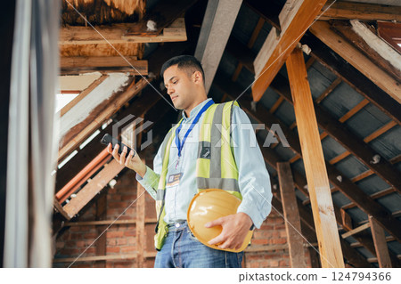 Building, engineering and construction worker with phone in hand texting, typing and online. Technology, construction and architect, engineer or contractor in building site on internet on smartphone Building, engineering and construction worker with phone in hand texting, typing and online. Technology, construction and architect, engineer or contractor in building site on internet on smartphone 124794366
