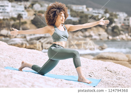 Woman, afro or beach yoga mat for relax stretching, fitness workout or exercise on Brazilian ocean, sea or water rock. Smile, happy or zen yogi in pilates training for mental health or body wellness Woman, afro or beach yoga mat for relax stretching, fitness workout or exercise on Brazilian ocean, sea or water rock. Smile, happy or zen yogi in pilates training for mental health or body wellness 124794368