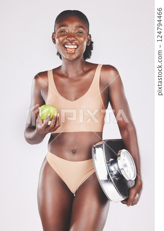 Black woman, body and weight health scale portrait for beauty, skincare and healthy lifestyle wellness. African girl, happy and fitness motivation training for body care in white background studio 124794466