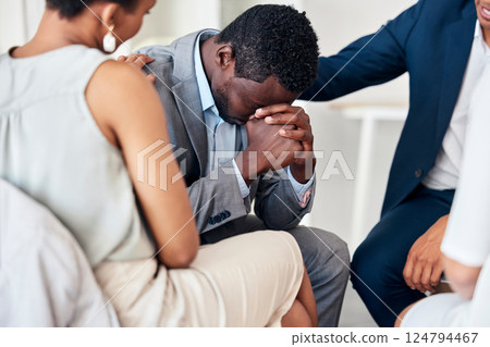 Black businessman, stress or office support circle in mental health, company burnout or diversity corporate anxiety. Men, women or teamwork collaboration in group therapy, trust or psychology meeting 124794467