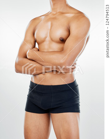 Fitness, diet and bodybuilder man in studio for exercise, training and workout for fit, healthy and strong body for motivation to lose weight. Male athlete topless for growth, progress and underwear Fitness, diet and bodybuilder man in studio for exercise, training and workout for fit, healthy and strong body for motivation to lose weight. Male athlete topless for growth, progress and underwear 124794513