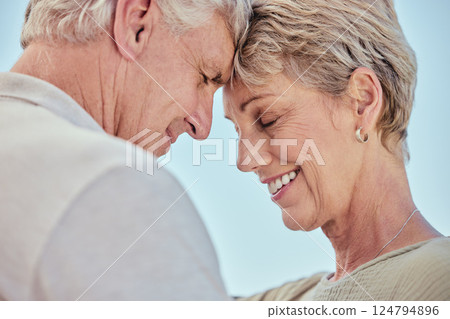 Senior, couple with forehead touch and smile for love with care, bonding and retirement outdoor. Elderly man, woman and happy for romance closeup with embrace, happiness and face to face in summer 124794896