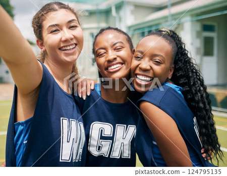Sports, team and girl netball selfie, hug with fitness and college or school club with outdoor portrait. Exercise, competitive sport and happy people, smile in picture and player training on court. 124795135