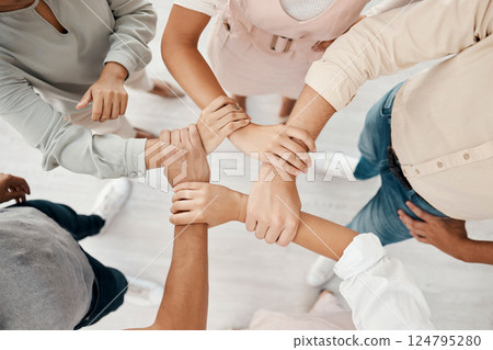 Top view, business people or holding wrist in support, growth power or marketing community, team building or office trust. Creative teamwork, collaboration success or men with women diversity circle Top view, business people or holding wrist in support, growth power or marketing community, team building or office trust. Creative teamwork, collaboration success or men with women diversity circle 124795280