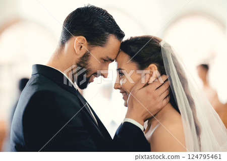 Couple love, wedding and face together for support, care and trust. Happy bride, groom smile and forehead eye contact for marriage, happiness and romantic partnership on special day celebration Couple love, wedding and face together for support, care and trust. Happy bride, groom smile and forehead eye contact for marriage, happiness and romantic partnership on special day celebration 124795461