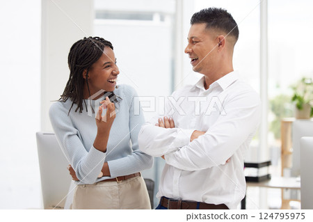 Diversity, office and work friends in conversation, talking and laughing together on break. Communication, friendship and happiness in the workplace with black woman and man chat, speaking and joke 124795975