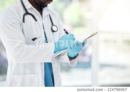 Healthcare, paper and doctor writing in a hospital, insurance and compliance form before surgery. Hands, medical and record by health worker write clipboard note, prescription and medicine planning Healthcare, paper and doctor writing in a hospital, insurance and compliance form before surgery. Hands, medical and record by health worker write clipboard note, prescription and medicine planning 124796067
