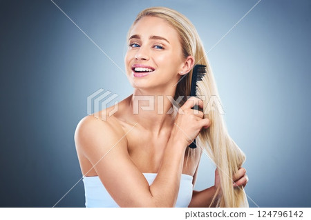 Portrait, brush hair and woman cosmetic wellness growth treatment. Happy girl model, healthy morning routine and natural strong haircare lifestyle for self care beauty styling in background studio Portrait, brush hair and woman cosmetic wellness growth treatment. Happy girl model, healthy morning routine and natural strong haircare lifestyle for self care beauty styling in background studio 124796142