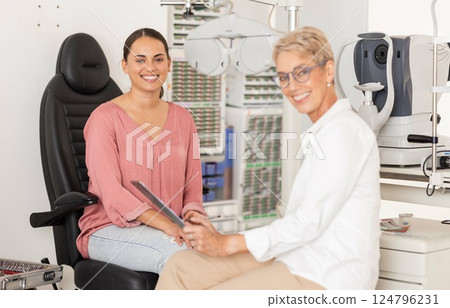 Eye, doctor and patient in medical exam room for vision assessment, insurance checklist and consultation test in happy portrait. Optometrist woman and client consulting with tools for eye care check Eye, doctor and patient in medical exam room for vision assessment, insurance checklist and consultation test in happy portrait. Optometrist woman and client consulting with tools for eye care check 124796231