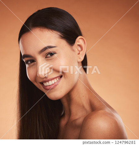 Hair care, beauty and portrait of a woman with a smile for makeup, skincare and wellness against a brown mockup studio background. Happy, luxury and girl model with beautiful hair and mock up space Hair care, beauty and portrait of a woman with a smile for makeup, skincare and wellness against a brown mockup studio background. Happy, luxury and girl model with beautiful hair and mock up space 124796281