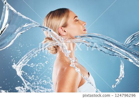 Water splash, beauty and skincare with a woman in studio for health, wellness and self care with dermatology, cosmetic and natural makeup. Model with a clean skin, body and face for healthy lifestyle 124796296