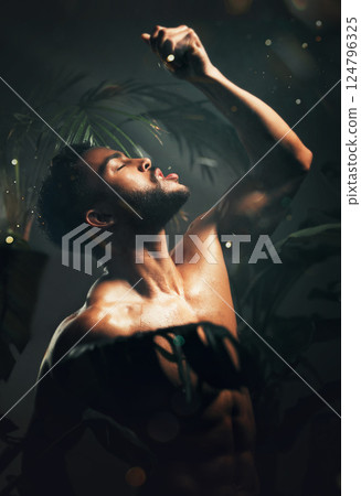 Nature beauty, vitamin c and man with orange for body hydration, organic skincare routine or health wellness. Tropical shadow Light, orange juice and aesthetic model squeeze fruit for liquid detox 124796325