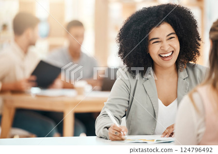 Happy black woman writing notes in office meeting, planning and strategy development with business motivation, happiness and mission for goals. Smile young business professional conversation at desk Happy black woman writing notes in office meeting, planning and strategy development with business motivation, happiness and mission for goals. Smile young business professional conversation at desk 124796492