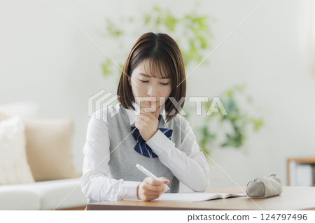 High school girl studying in the living room 124797496