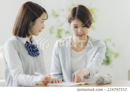 High school girl and tutor 124797557