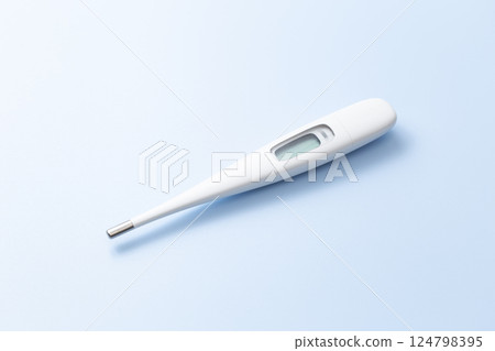 Thermometer on a blue background 124798395