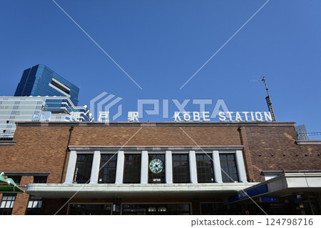 Kobe Station shining against the blue sky Kobe Station shining against the blue sky 124798716