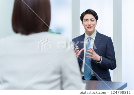 Business man receiving an interview 124798811