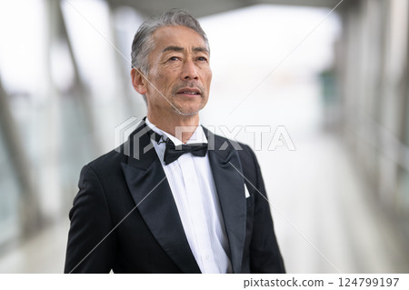 Portrait of a senior man in a tuxedo Portrait of a senior man in a tuxedo 124799197
