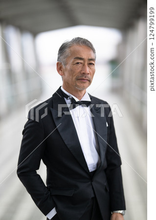 Portrait of a senior man in a tuxedo Portrait of a senior man in a tuxedo 124799199