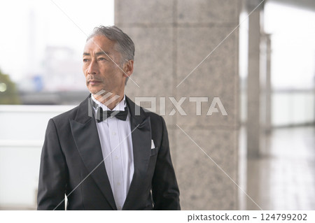 Portrait of a senior man in a tuxedo Portrait of a senior man in a tuxedo 124799202