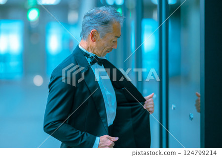 Portrait of a senior man in a tuxedo Portrait of a senior man in a tuxedo 124799214