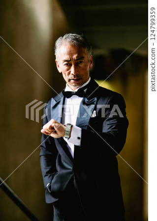 Portrait of a senior man in a tuxedo Portrait of a senior man in a tuxedo 124799359