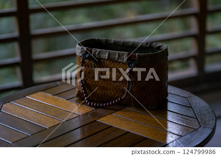 A handmade bath basket placed in a guest room at a traditional Japanese inn 124799986