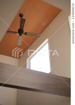 ceiling fan installed in the ceiling ceiling fan installed in the ceiling 124800619