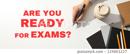 Are you ready for exam, Students prepare for exams with notes, stationery, and beverages on a clean white desk, focusing on effective study habits and strategies 124801227