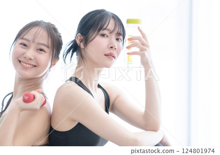 Beauty image of a young woman in training wear Beauty image of a young woman in training wear 124801974