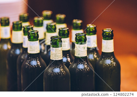 Bottles lined up 124802274