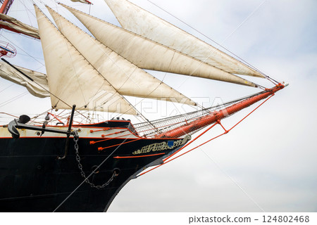 Old-fashioned sailing regatta with stretched sails - detail. Copy space. Old-fashioned sailing regatta with stretched sails - detail. Copy space. 124802468