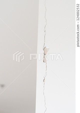 Cracked concrete wall broken wall after Earthquake effect. Damage building, danger and Emergency Cracked concrete wall broken wall after Earthquake effect. Damage building, danger and Emergency 124802532