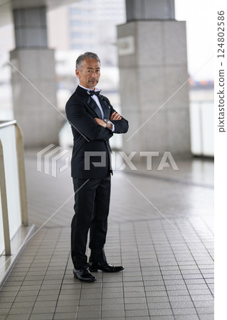 Portrait of a senior man walking in a business district 124802586