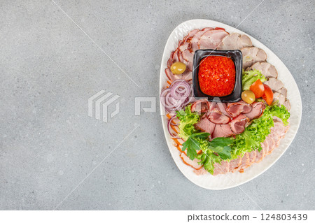 Appetizers with different antipasti, snacks. Sausage, ham, tapas, for party. Top view Appetizers with different antipasti, snacks. Sausage, ham, tapas, for party. Top view 124803439