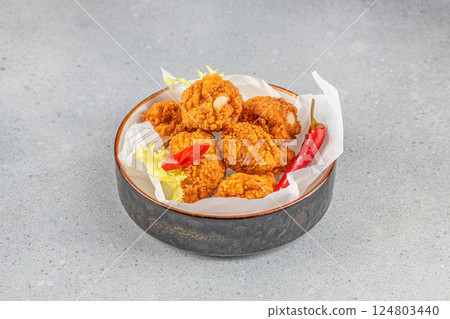 Fried Mozzarella Cheese Balls from the hot air fryer oven. appetizer on a light background, top view. copy space 124803440