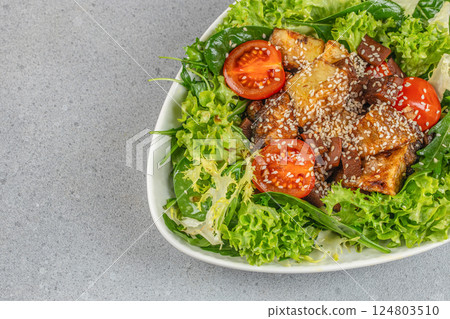 vegetable salad with eggplant. Healthy, clean eating. Vegan or gluten free diet. top view. copy space 124803510