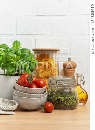 Fresh ingredients creating delicious italian cuisine on kitchen counter 124803619