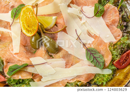 Salmon carpaccio, salad salmon appetizer served on a plate, copy space, top view Salmon carpaccio, salad salmon appetizer served on a plate, copy space, top view 124803629
