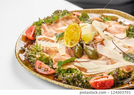 Salmon carpaccio, salad salmon appetizer served on a plate, copy space, top view 124803701