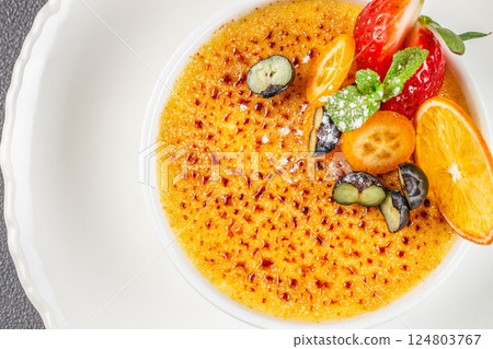 Sweet cream dessert with fresh fruits, cream and cane sugar. Close up. top view 124803767