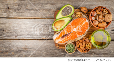 Various balanced useful components healthy low carbohydrate foods on a wooden background. top view. copy space Various balanced useful components healthy low carbohydrate foods on a wooden background. top view. copy space 124803779
